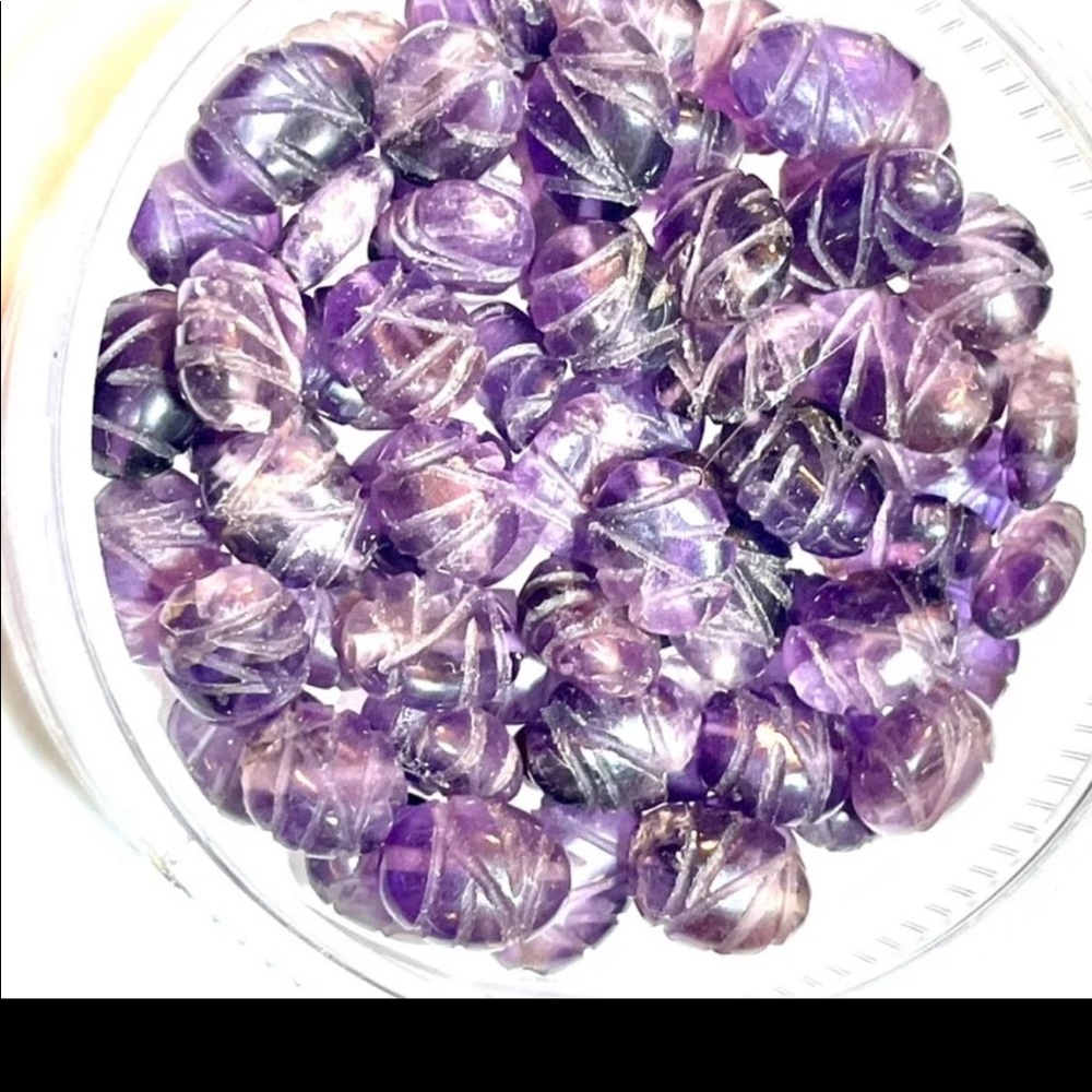 Lot of Beautifully Carved Amethyst Beads
